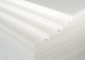 thick white slabs of Polytetrafluoroethylene PTFE teflon stacked on each other