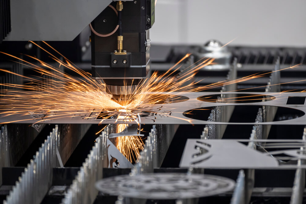 The fiber laser cutting machine cutting machine cut the metal plate. The hi-technology sheet metal manufacturing process by laser cutting machine.