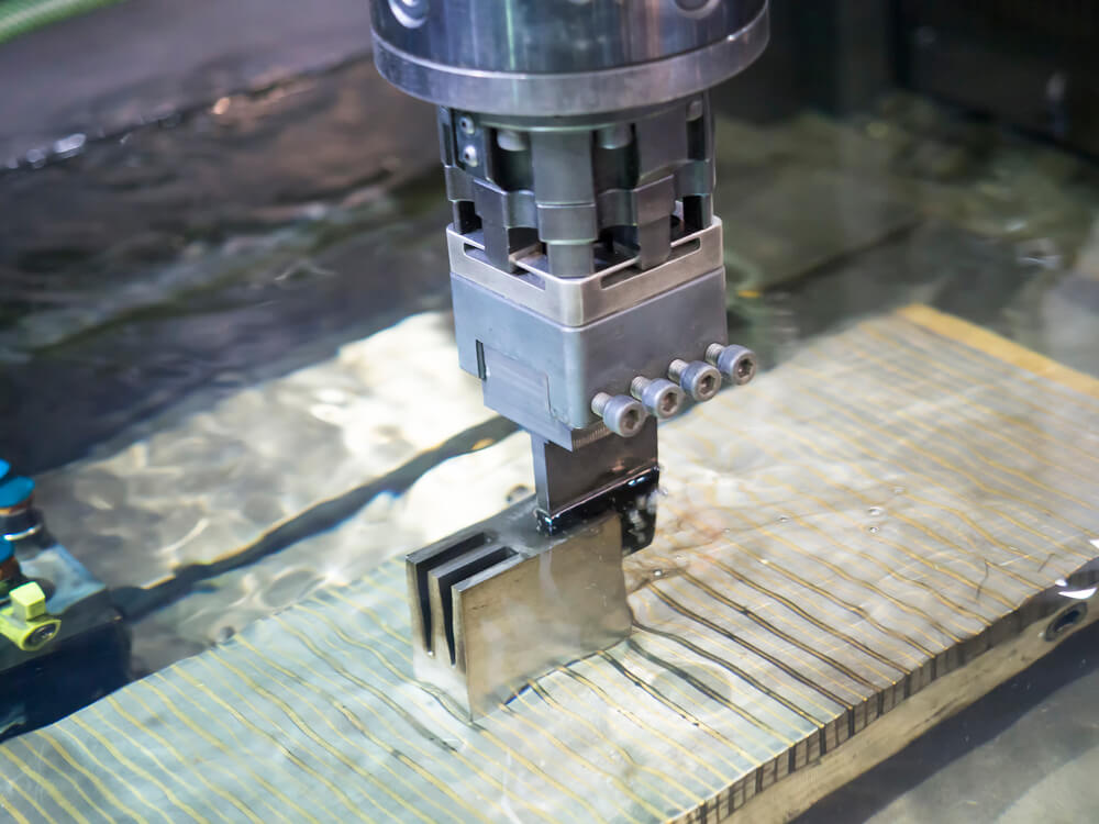 Operator use EDM electrod to make precision mold and die — Photo
